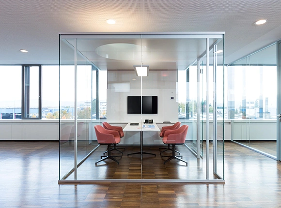 Modern glass conference room.