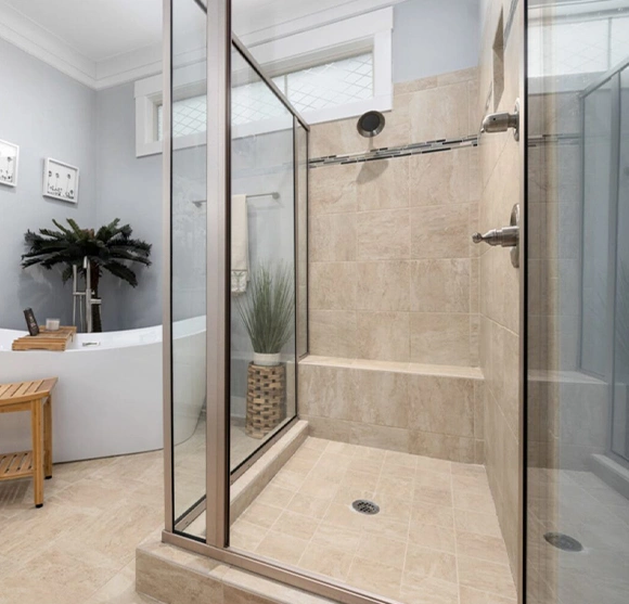 Modern bathroom with glass shower and stylish fixtures.